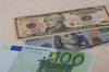 Курсы доллара и евро снизились после решения ЦБ по ключевой ставке