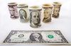 Биржевой курс доллара впервые с 21 июля упал ниже 64 рублей