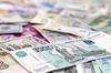 Рубль в начале четверга вырос на 14 копеек к доллару