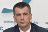 Группа «Онэксим» Прохорова после обысков продает все российские активы